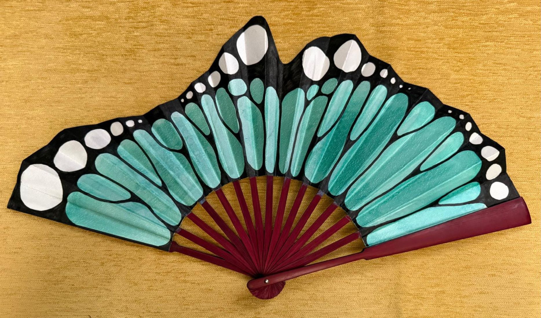 Abanico ala mariposa verde agua